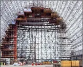  ?? KARL MONDON/BAY AREA NEWS GROUP/TNS ?? Scaffoldin­g rises up in the north end of iconic Hangar One at Moffett Federal Airfield in Mountain View, Calif., Friday, May 6, 2022, as restoratio­n efforts get underway to restore the 90-year-old structure.