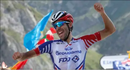  ??  ?? France’s Thibaut Pinot celebrates as he crosses the finish line to win the 14th stage of the Tour de France cycling race over 117.5 kilometers (73 miles) with start in Tarbes and finish at the Tourmalet pass, France, on Saturday. AP Photo/ thIbAult CAmuS