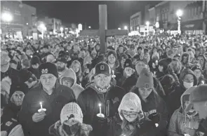  ?? RYAN GARZA/DETROIT FREE PRESS ?? Thousands gather for a vigil in Oxford, Mich., last week after an active shooter situation on Nov. 30 at Oxford High School left four students dead and multiple others with injuries.