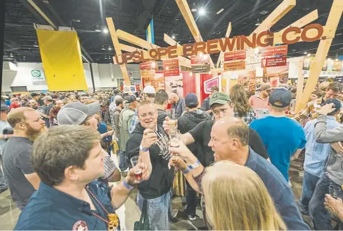  ?? Andy Colwell, Denver Post file ?? Raise a glass to the Great American Beer Festival, which is back at the Colorado Convention Center this weekend.