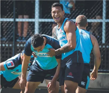 ?? Picture: TOBY ZERNA ?? Israel Folau (right) shares a laugh with Waratahs teammates at training.