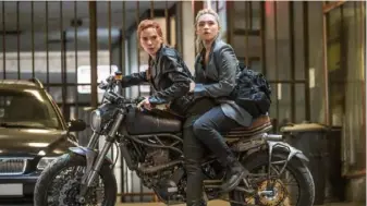  ?? Jay Maidment/Marvel Studios ?? Scarlett Johansson and Florence Pugh are in for a wild ride in "Black Widow," coming to theaters and Disney+ Premier Access July 9.