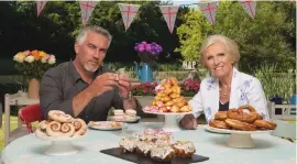 ??  ?? Paul Hollywood and former co-host Mary Berry