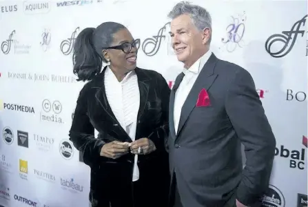  ?? JASON PAYNE/PNG ?? Oprah Winfrey with David Foster on the red carpet at the David Foster Foundation 30th Anniversar­y Miracle Gale and Concert in Vancouver, on Saturday.