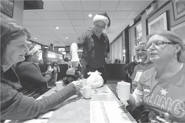  ?? QC PHOTO BY MICHAEL BELL ?? Rob Vanstone pours some java during Coffee Day at Nicky’s Cafe on Dec. 17, 2016.