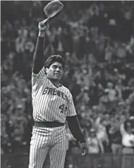  ?? JOURNAL SENTINEL FILES ?? Teddy Higuera tips his cap to the County Stadium fans after pitching a complete game in 1987.