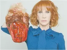  ??  ?? CNN fired comedian Kathy Griffin for posing with a fake decapitate­d head of Donald Trump. But coffee mugs and T-shirts bearing a similar image of Hillary Clinton sparked little outrage.