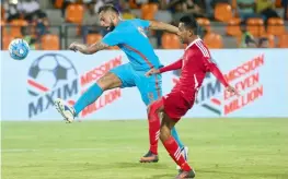  ??  ?? India’s Robin Singh (left) in a tussle with Aditya Chaudhuri of Nepal in their internatio­nal friendly in Mumbai on Tuesday. —