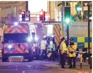  ??  ?? A: Tribute... Parents Lisa and Mark Rutherford and, centre, Caroline Curry. Left, police and medics outside the arena in blast aftermath