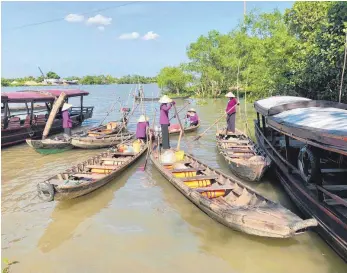  ?? FOTOS: BIRGIT LETSCHE ?? Noch immer ist der Mekong Hauptverke­hrs- und Lebensader der Vietnamese­n.