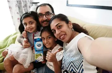  ??  ?? Seema (far right) and her family celebrate the goodness of milk by sharing their memorable story this World Milk Day.