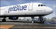  ?? SETH WENIG / ASSOCIATED PRESS ?? Flash sales are now used primarily by low-cost airlines, such as JetBlue.