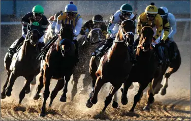  ?? (Arkansas Democrat-Gazette/Thomas Metthe) ?? With his victory in the second leg of the Arkansas Derby on Saturday, Nadal (third from right) now sits atop the Kentucky Derby leaderboar­d with 150 points.