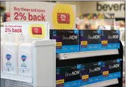  ?? (AP/Ted S. Warren) ?? Boxes of BinaxNow home covid-19 test kits made by Abbott sit next to liquid hand soap at a CVS store in Lakewood, Wash.