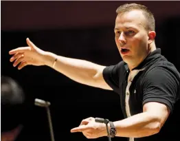  ?? — AP ?? File photo of Philadelph­ia Orchestra rehearsing with its new music director and conductor Yannick Nezet- Seguin at the Kimmel Center, in Philadelph­ia. Nezet- Seguin will succeed James Levine as music director of the Metropolit­an Opera but will not take...