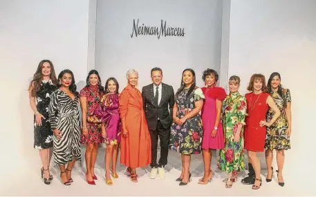  ?? Photos by Gary Fountain / Contributo­r ?? The Best Dressed honorees pose with fashion designer Naeem Khan, center — Brigitte Kalai, from left, Elia Gabbanelli, Kristy Bradshaw, Michele Leal Farah, Gayla Gardner, Lauren Randle, Crystal Wright, Kelley Lubanko, Vicki West and Sippi Khurana.