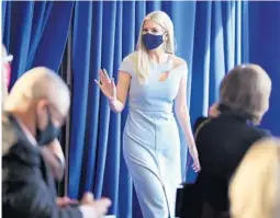  ?? STEPHEN M. DOWELL/ORLANDO SENTINEL ?? White House adviser Ivanka Trump waves as she arrives to speak to campaign supporters at the Citrus Club in Orlando on Wednesday.