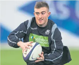  ??  ?? Richard Cockerill, top, enjoys helping to develop young Scottish talent such as Under-20 stand-off Nathan Chamberlai­n. Pictures: SNS.