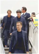  ?? REUTERS ?? German coach Joachim Low and team manager Olivier Bierhoff arrive in Moscow.