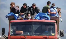  ?? Irakli Gedenidze/Reuters ?? Refugees from Nagorno-Karabakh arrive in Kornidzor, Armenia, on Wednesday. Photograph: