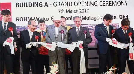  ??  ?? Bigger operations: Mustapha (third from right), Ahmad, Yosuke (second from left) and other Rohm-Wako officials at the plant opening ceremony.