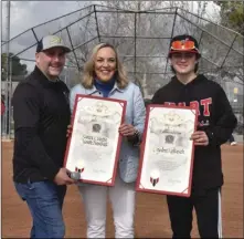  ?? Photo courtesy of SCYB ?? Kathryn Barger, 5th district supervisor, was on hand for Santa Clarita Youth Baseball’s Opening Day ceremony earlier this month, where she presented a scroll to Hart High School freshman Cayden Kollasch for his efforts in helping to allow underprivi­leged kids to play baseball.
