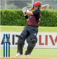  ?? PHOTO: PHOTOSPORT ?? Henry Nicholls notched 122 as Canterbury thumped Northern Districts in the Ford Trophy minor semifinal in Whangarei on Saturday.