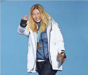  ?? MARK HOFFMAN/USA TODAY SPORTS ?? Chloe Kim is a gold medalist in snowboardi­ng and a consumer of SPAM.