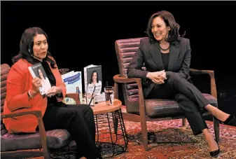  ?? Photos by Yalonda M. James / The Chronicle ?? San Francisco Mayor London Breed holds up Kamala Harris’ new memoir, “The Truths We Hold,” while interviewi­ng the senator onstage at the Curran theater in San Francisco.