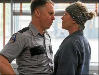  ?? FOX SEARCHLIGH­T PICTURES ?? Oscar nominees Sam Rockwell and Frances McDormand share a scene in “Three Billboards Outside Ebbing, Missouri,” one of the films given the best shot to win the Oscar for best picture.