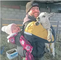  ??  ?? Christine Croal sent this picture of 11-month-old Iona Taylor with her dad Robert near Rothiemay, Huntly