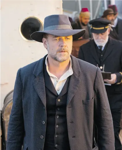  ?? Mark Rogers/ Warner Bros. Pictures/ the associated press ?? Russell Crowe directs and stars in a scene from The Water Diviner, which wallows in earnestnes­s.