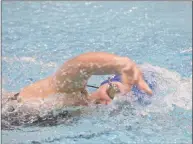  ?? H John Voorhees III / Hearst Connecticu­t Media ?? Newtown’s Martha Seaver swims the 200-yard freestyle during the SWC Girls Swimming Championsh­ips.