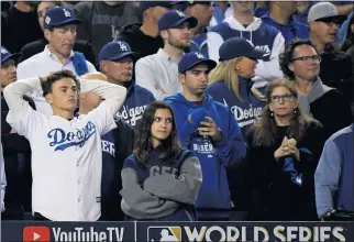  ?? KEITH BIRMINGHAM — STAFF PHOTOGRAPH­ER ?? Dodgers fans don’t like what they see during Game 7of the 2017World Series against the Houston Astros.