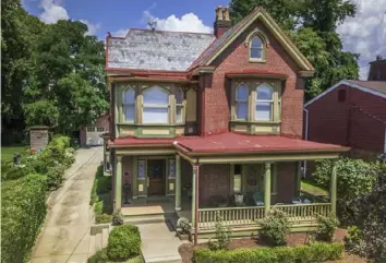  ?? Micheal Callaway ?? The Gothic Revival-style house at 1410 Pennsylvan­ia Ave. in Manchester is still available.