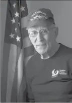  ?? CLOE POISSON|
CPOISSON @COURANT.COM ?? ARMAND JOLLY, of Pomfret, will walk a mile in the 2nd annual Veterans Day Charity Three Miler road race at the Department of Veterans Affairs campus in Rocky Hill on Saturday. Jolly, 96, served in the Navy aboard the U.S.S. Emmons, a Navy destroyer that was sunk in the waters off Okinawa,Japan, in 1945 in a kamikaze attack.