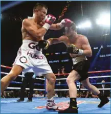  ?? Photo: ACTION IMAGES/ JOE CAMPOREALE ?? UNFINISHED BUSINESS: A third ght between Golovkin and Canelo is required