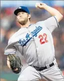  ?? Thearon W. Henderson Getty Images ?? CLAYTON KERSHAW strikes out nine in six innings of no-decision.