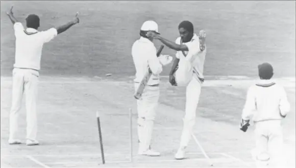  ??  ?? FLASHBACK! Michael Holding kicks the stumps in anger. (Getty Images)