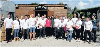  ??  ?? Members of National Lottery operator Camelot’s retail sales team and colleagues from James Hall Spar all offered their time as part of the company’s ‘Living Life Changing’ volunteeri­ng scheme