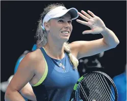  ??  ?? Former world No 1 Caroline Wozniacki is three matches away from lifting the Australian Open.