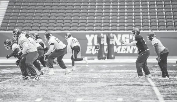  ?? BRANDON HARDER ?? Roughrider­s quarterbac­k Zach Collaros takes a snap at practice on Wednesday at Mosaic Stadium. The Riders face the Bombers on Sunday in the West Division semifinal.