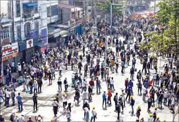  ?? AFP ?? Protesters take part in a demonstrat­ion against the military coup in Yangon on Monday.