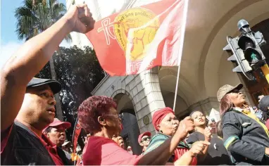  ?? PICTURE: COURTNEY AFRICA ?? MAY DAY: Nehawu and Cosatu marched to the provincial legislatur­e offices then to Parliament in Cape Town as part of their May Day event.