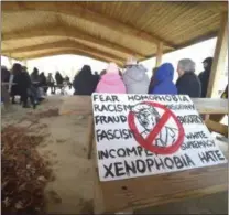  ?? PETE BANNAN - MEDIANEWS GROUP ?? Chester County attendees at the national day of protest against the border emergency that President Donald Trump enacted Friday. The event was held in the Veterans Memorial Pavilion at East Goshen Township Park on Monday.