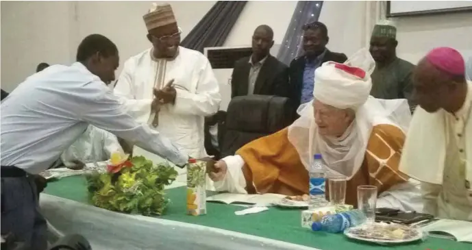  ??  ?? L-R: Niger State deputy governor, Alhaji Ahmed Mohammed Ketso, a student who acted as Rev. father O'Connell in a drama being congratula­ted by the celebrant, Rev. Father O'Connell while Bishop Uzougwu looks on