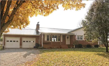  ?? CONTRIBUTE­D PHOTOS BY KATHY TYLER ?? This renovated ranch, which offers about 1,380 sq. ft. of living space, has an open floor plan with a full, finished basement that includes a large bedroom with egress window and full bathroom.