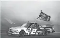  ?? PATRICK BREEN/THE REPUBLIC ?? Sheldon Creed does a burnout Friday after winning the Lucas Oil 150, which netted him the season title.