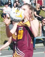  ??  ?? Drouin GD Sarah Dunn combined with GK Kym Diston to thwart Traralgon’s goalers.