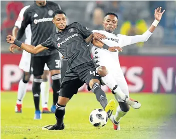  ?? Picture: GALLO IMAGES/LEFTY SHIVAMBU ?? SECRET WEAPON: Bafana and Orlando Pirates star Vincent Pule, left, seen here fighting for the ball with Thabang Monare of Bidvest Wits. Bafana captain Thulani Hlatshwayo feels the in-form Pule should get game time against Libya on Saturday.